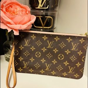 Authentic Louis Vuitton Neverfull Pouch.